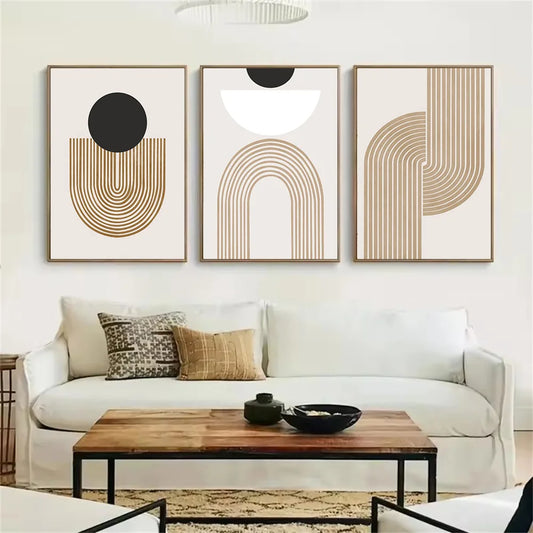 Modern living room with a white sofa, wooden coffee table, and abstract wall art.