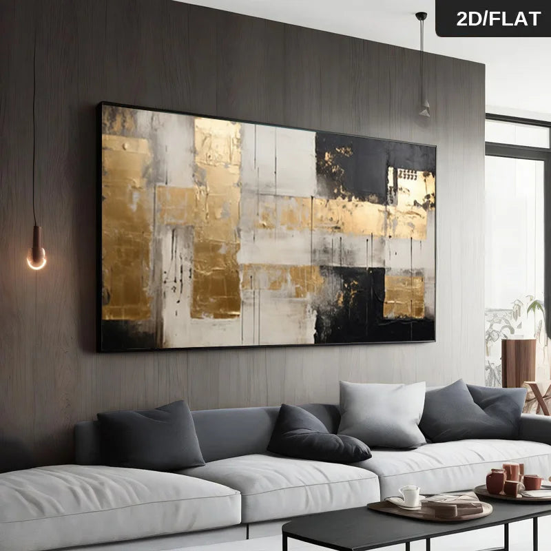 A large rectangular abstract wall art piece with black, gold, white, and gray brushstrokes hanging above a modern white sofa in a contemporary living room. 