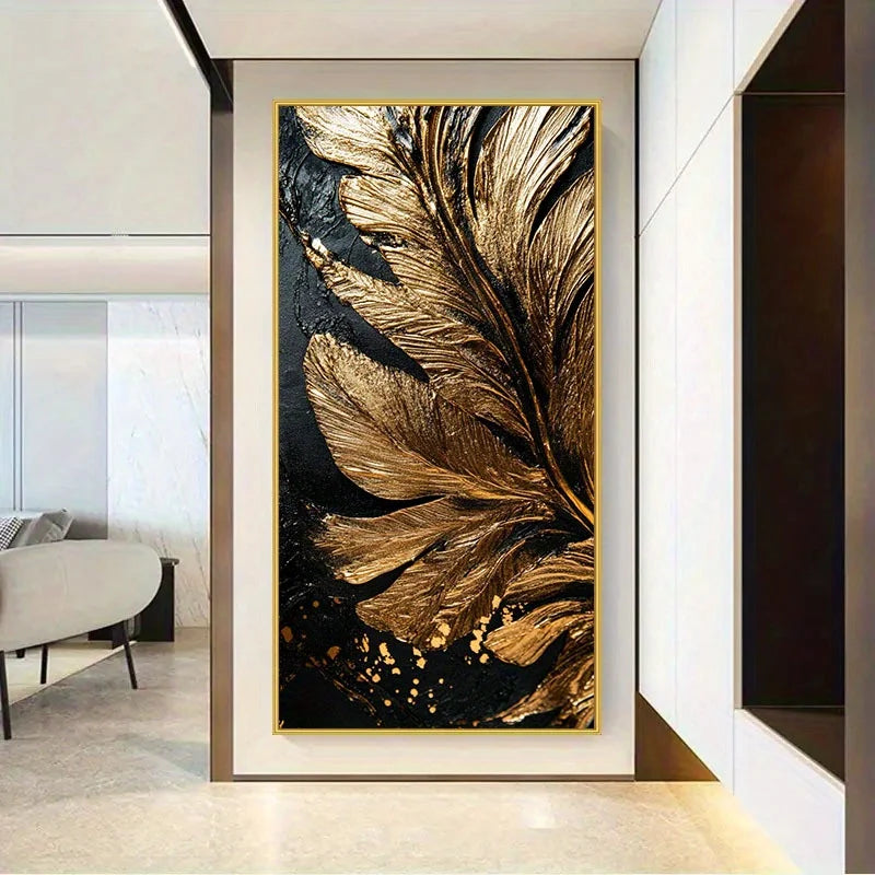 A vertical wall art piece featuring an abstract large feather design in metallic gold over a black background, displayed in a modern interior hallway.