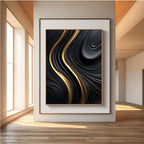 Abstract art piece with wavy patterns in black and gold on a wall in a modern room.