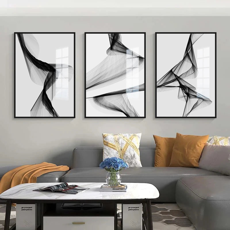 Modern living room with abstract wall art and a gray sofa.