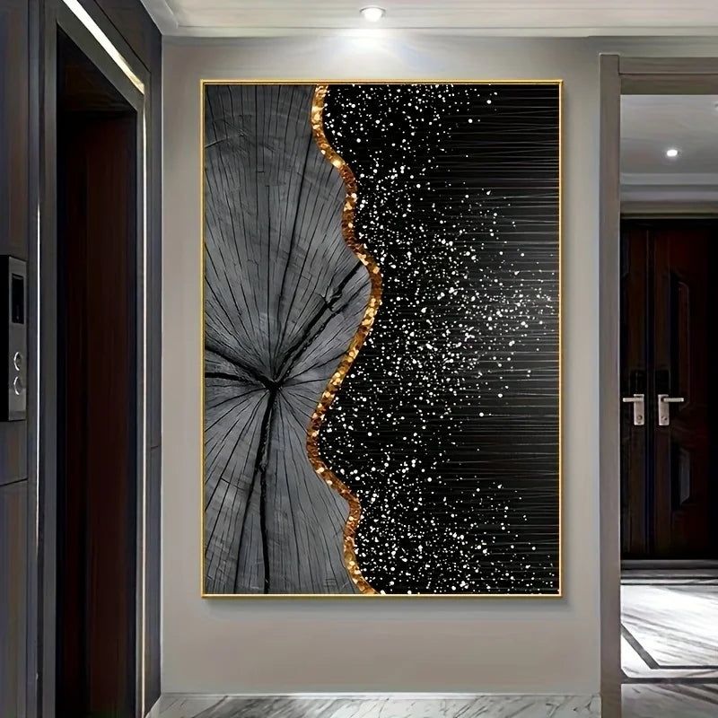 A large wall art piece hanging in a hallway, featuring a black and gray wood-grain style design with a wavy gold border and white speckled texture on the right side.