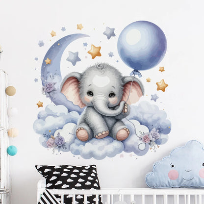 Children's room with a wall decal of an elephant holding a balloon on a cloud, surrounded by stars and a moon.