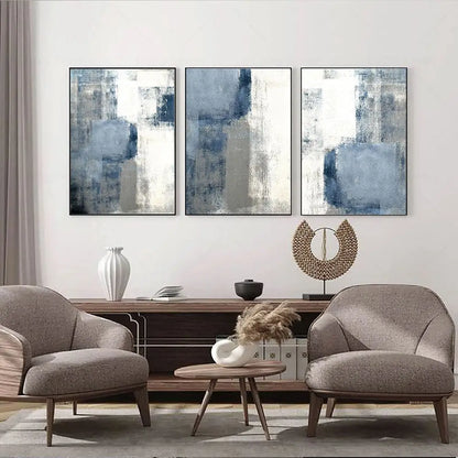 Modern living room with abstract wall art, furniture, and decor items.