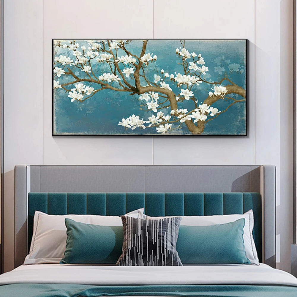 Bedroom with teal upholstered headboard and floral painting on wall