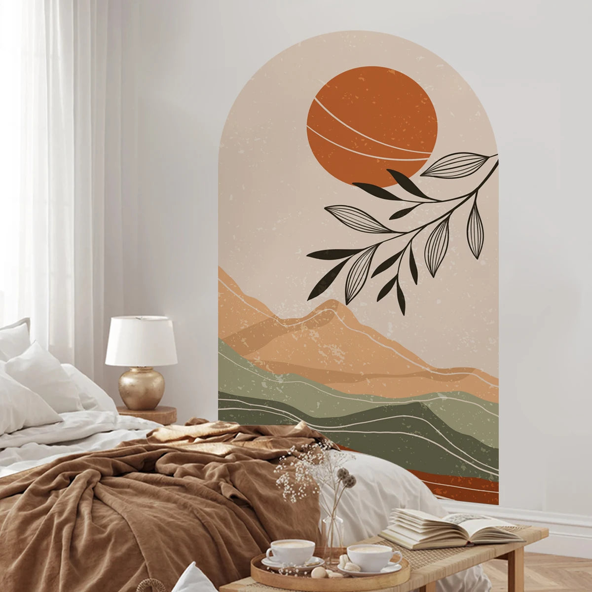 Decorative wall mural with a sunset and mountain design in a bedroom setting.