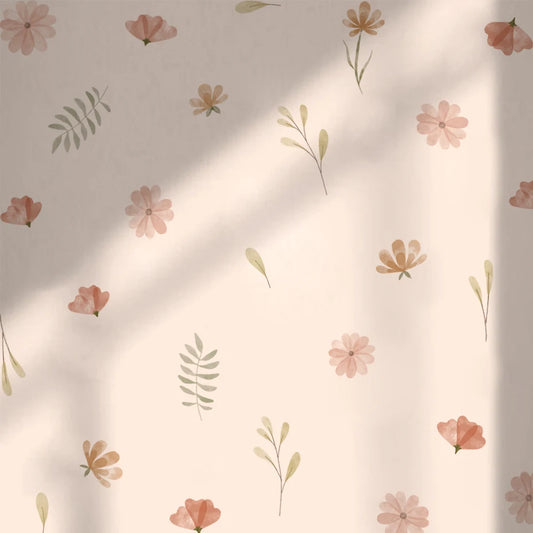 Floral pattern with pink flowers and green leaves on a beige background