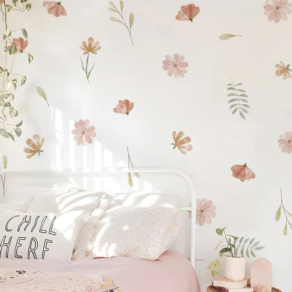 Floral wallpaper with a 'Chill Here' pillow on a bed