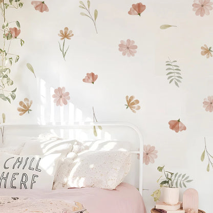 Floral wallpaper with a 'Chill Here' pillow on a bed
