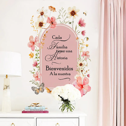 Decorative sign with floral elements and text on a white background