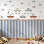 Children's room with striped wall, toy cars, and decorative elements.