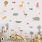 Children's room with animal-themed wall decals and toys on a light-colored floor.