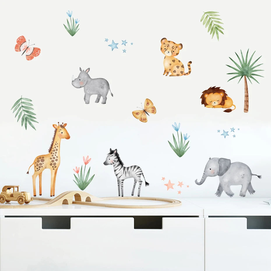 Jungle animal wall stickers on a white surface with a toy train track.