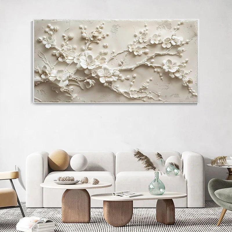 Decorative wall art of floral branches in a living room setting