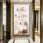Decorative wall art with flowers and vases in a modern hallway.