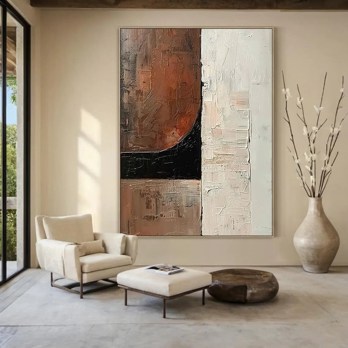 Modern living room with abstract art, armchair, and decorative vase.