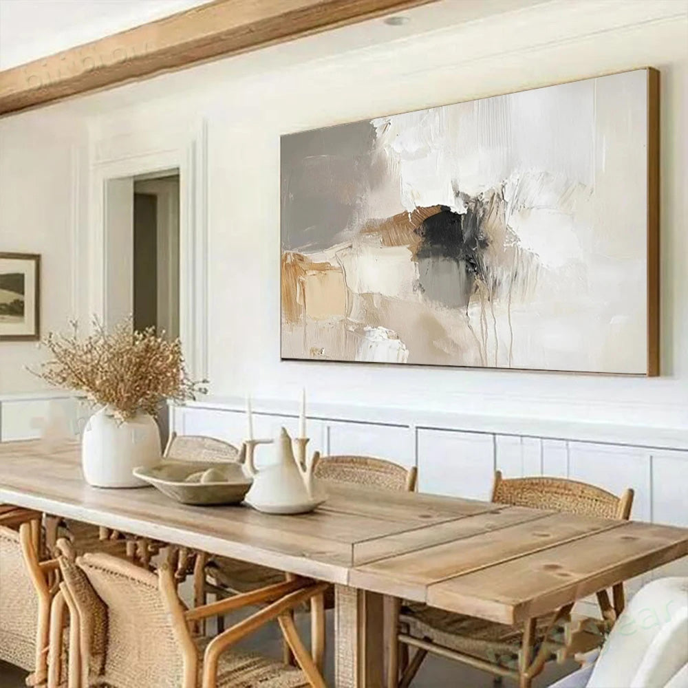 Dining room with wooden table and chairs, abstract painting on the wall.