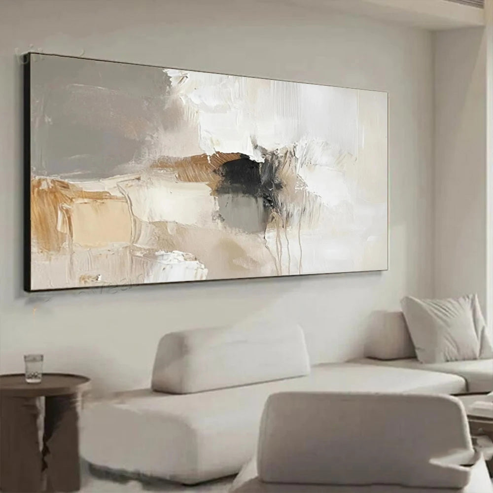Abstract painting on a wall in a modern living room with a sofa and side table.