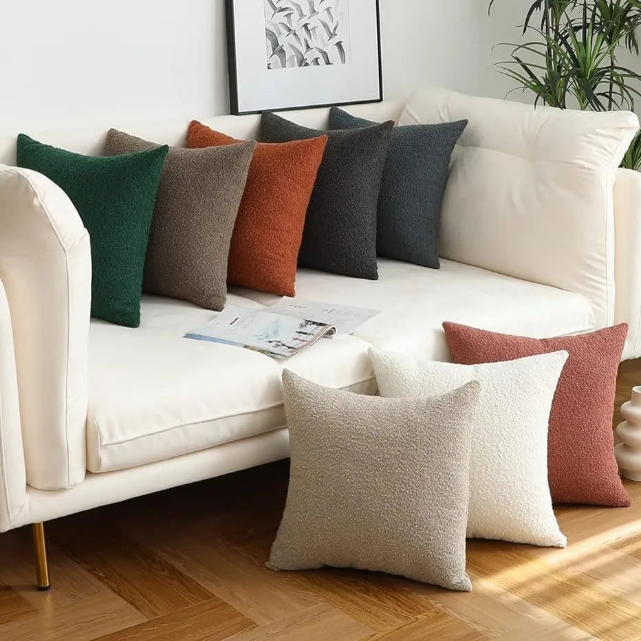 White sofa with colorful pillows in a living room setting