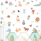 Wallpaper with various cartoon animals on a white background