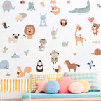 Children's room with colorful animal wall decals and a bench with patterned cushions.