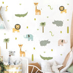 Children's room with jungle animal wall decals on a white wall.