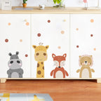 Cabinet with cartoon animal decals on a wooden floor
