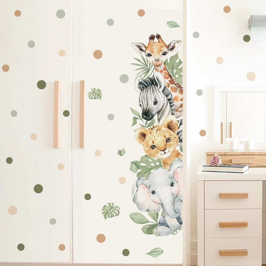 Wall decal with giraffe, zebra, and elephant on a polka dot wall.