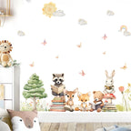 Children's room with wall decals of animals and nature elements.