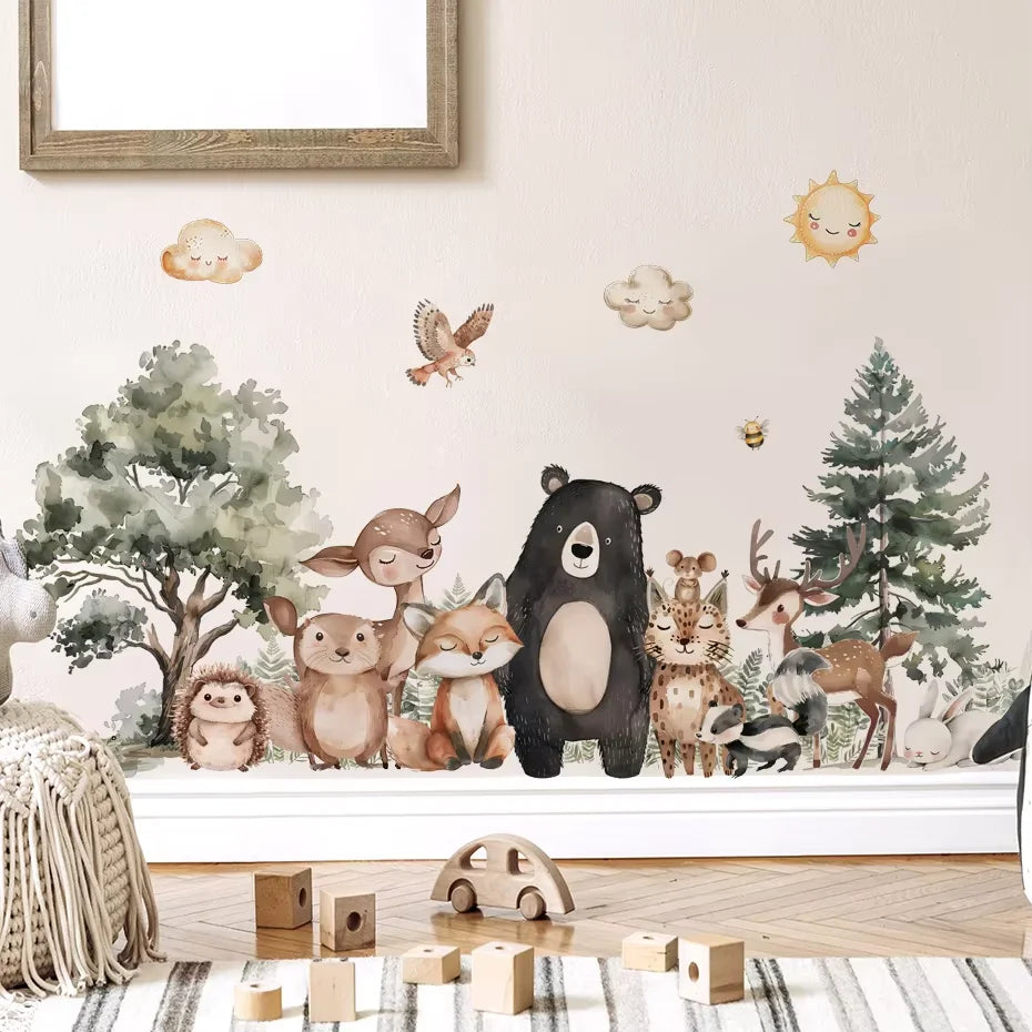 Wall decal of forest animals on a wall with toys below