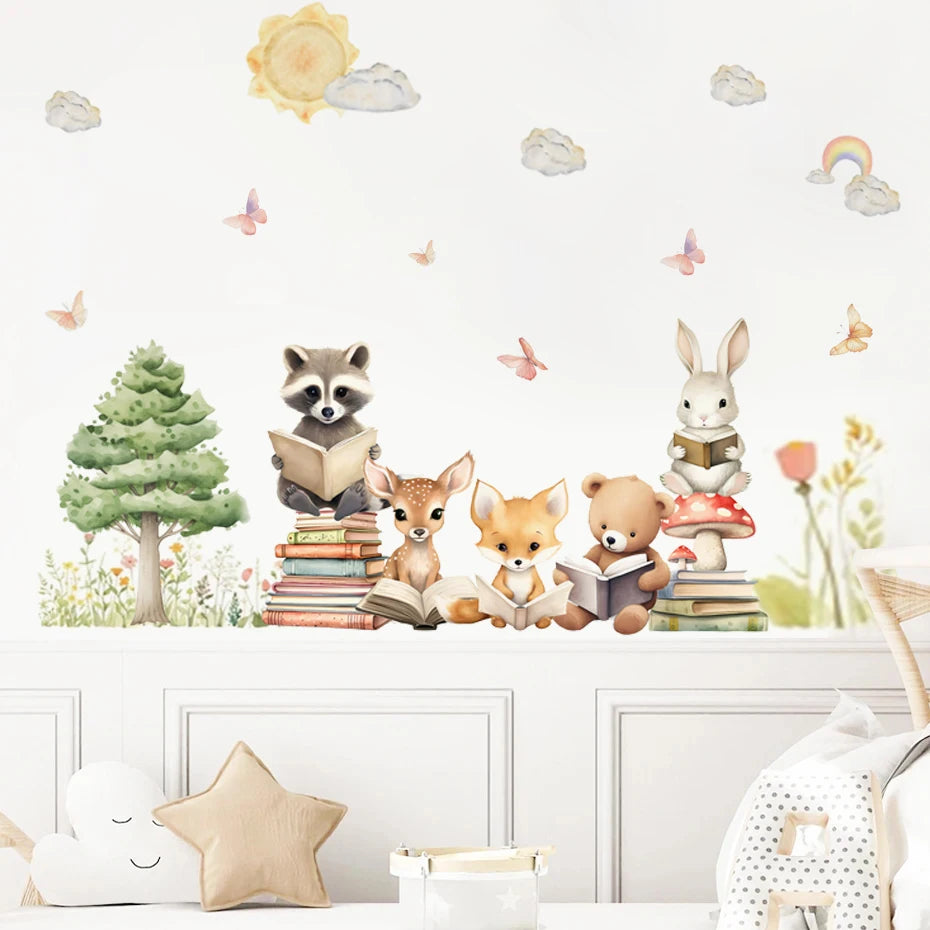 Wall decal of animals reading books with a tree, sun, and clouds in the background.