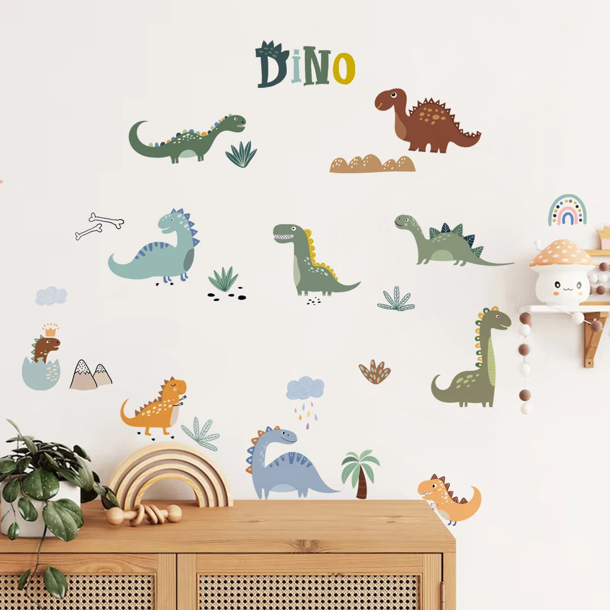 Children's room with dinosaur wall decals on a white wall.