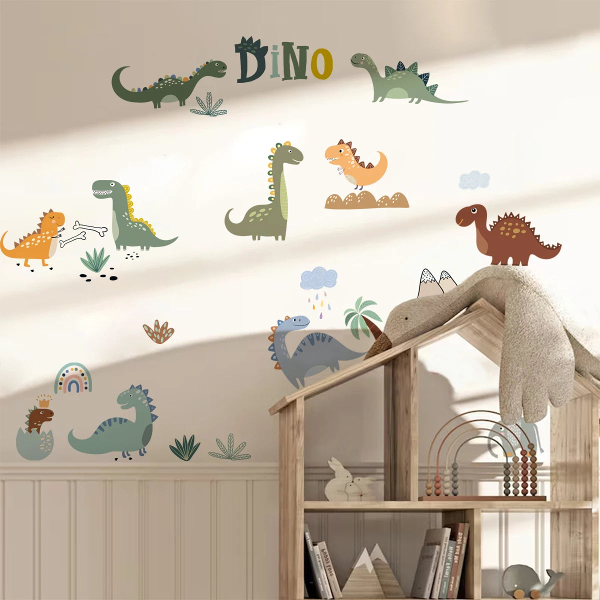 Children's room with dinosaur wall decals and a wooden playhouse.