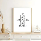 Framed motivational poster with 'If you can dream it, you can do it.' text on a wall above a dresser.