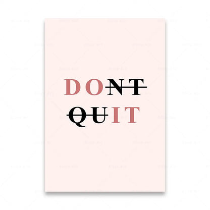 Motivational poster with 'DON'T QUIT' text on a light pink background