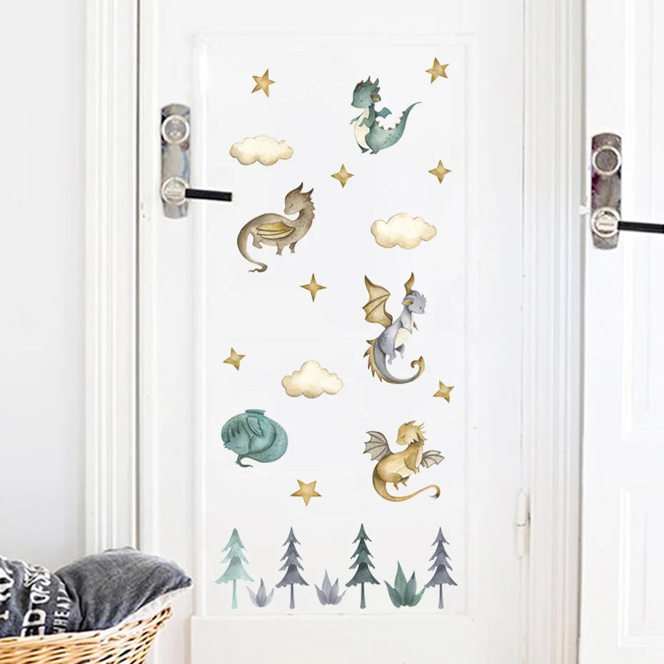 Decorative wall stickers of dragons, trees, and clouds on a white door.