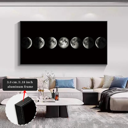 Framed artwork of moon phases on a wall in a living room.
