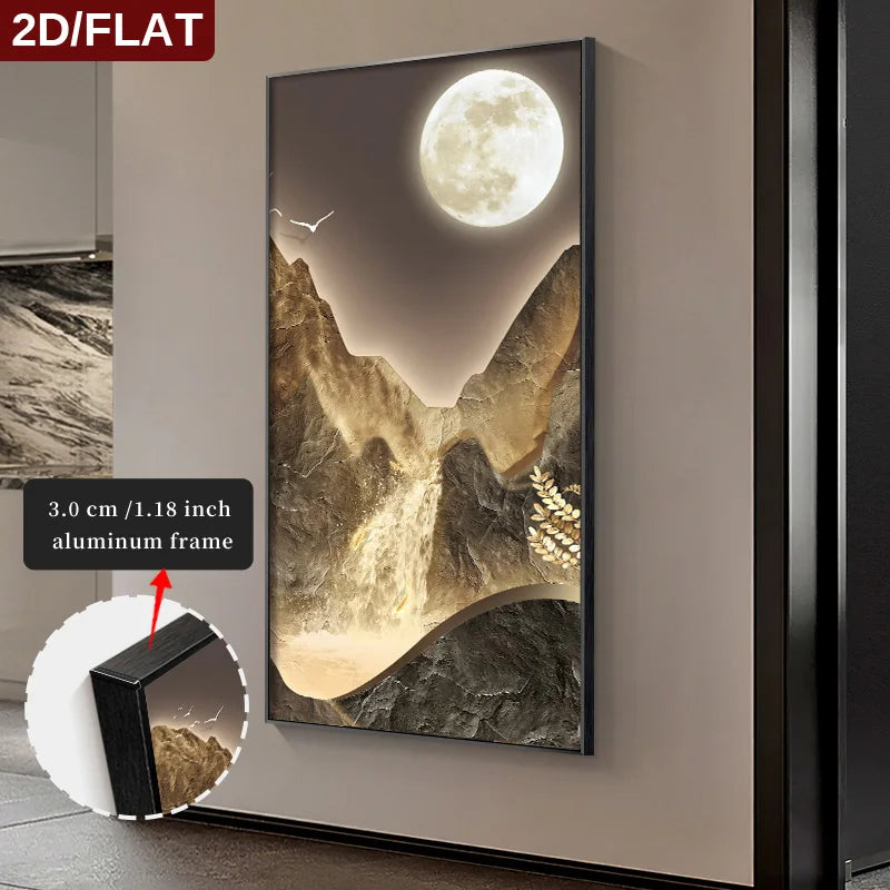 Framed artwork of a mountain scene with a moonlit sky on a wall.