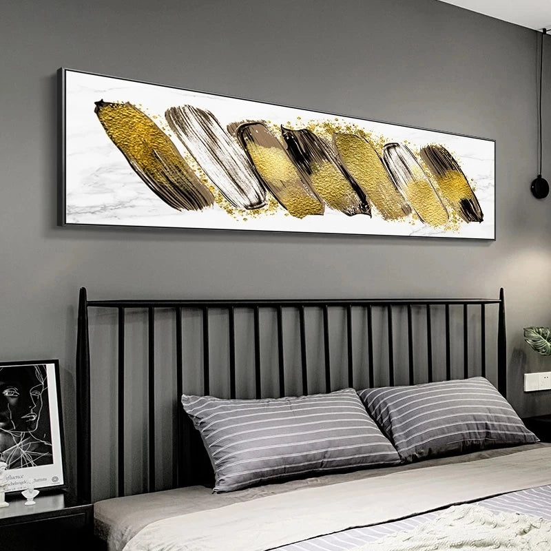 Abstract painting with gold and brown brush strokes above a bed in a bedroom setting.