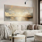 Modern living room with a large abstract painting on the wall, a light gray sofa, and decorative elements.