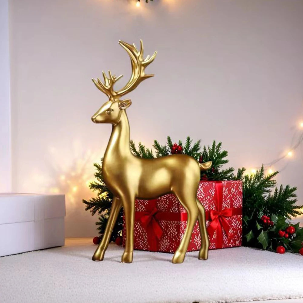 Gold deer ornament with red bow and gift box on a Christmas-themed background