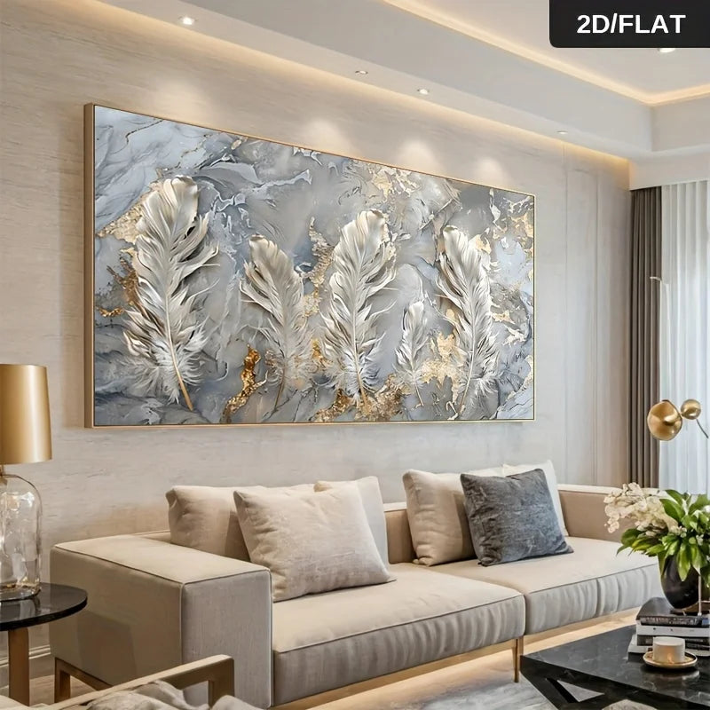A large rectangular wall art piece featuring three large white feathers with gold and gray marbled textures, displayed above a beige sofa in a modern living room. A black label in the top right corner reads '2D/FLAT'.
