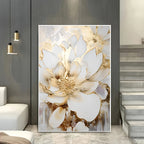 Decorative floral artwork with gold and white colors in a modern interior setting.