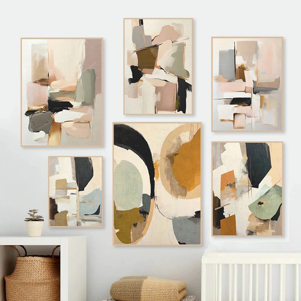 Set of abstract art prints on a wall with a neutral color palette.