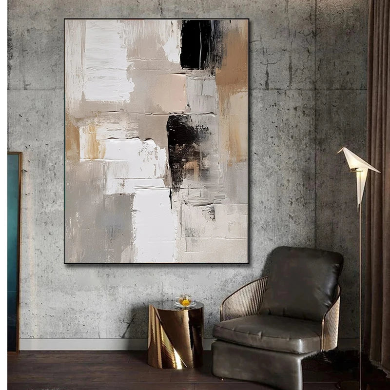 Abstract painting on a textured wall above a modern chair and side table.