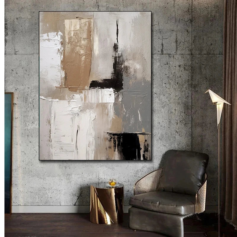 Abstract painting on a textured wall above a modern chair and side table.
