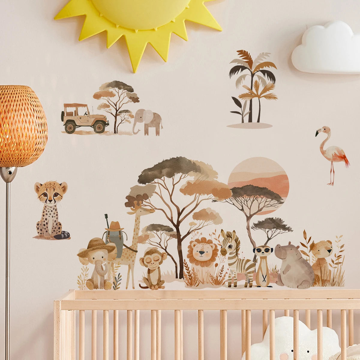Children's room with safari-themed wall decals, crib, and decorative items.