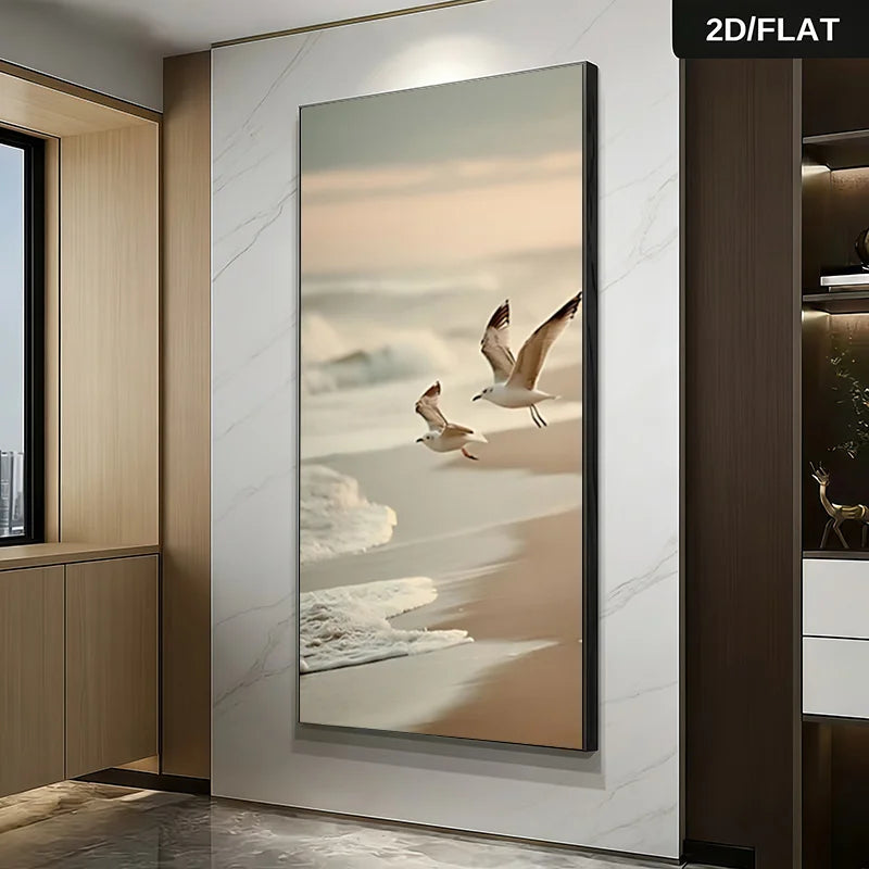 Framed artwork of birds flying over a beach scene on a wall.