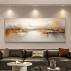 Living room with a large abstract painting above a brown leather sofa.