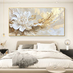 Decorative abstract painting on a wall above a bed in a bedroom setting.